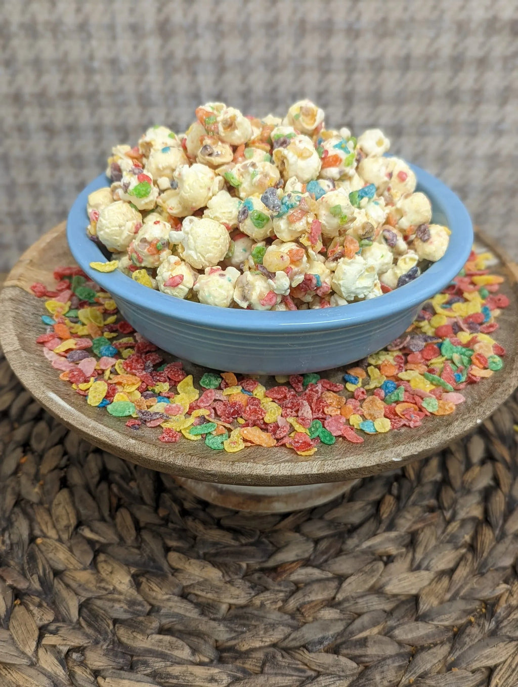 Rebels Pebbles by The Popcorn Loft mini popcorn in a blue bowl with cereal layer and colorful sprinkles