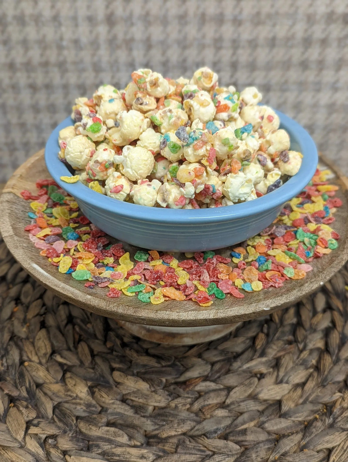 Rebels Pebbles by The Popcorn Loft mini popcorn in a blue bowl with cereal layer and colorful sprinkles
